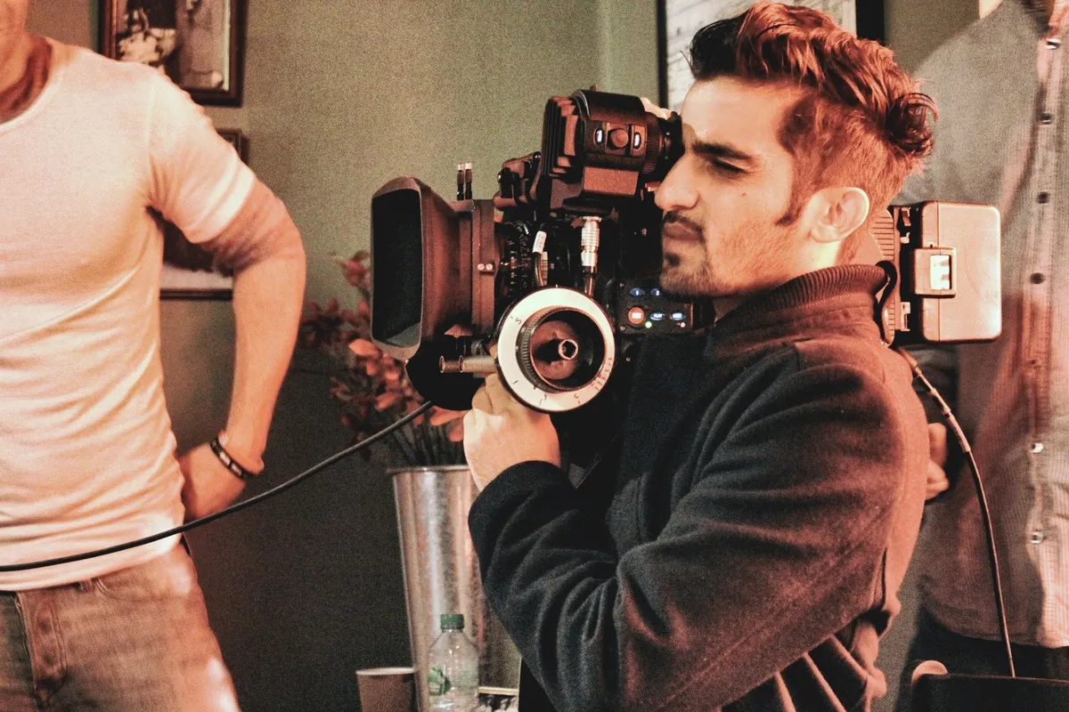 filmmaker-holding-arri-alexa-film-camera-filming-2022-11-11-08-53-26-utc-1