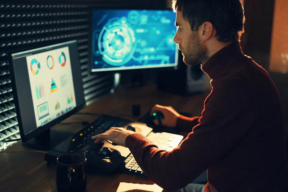 Male Videographer Edits and Cuts Footage and Sound on His Person